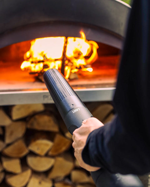 Looft Air LIghter X lighting a pizza oven